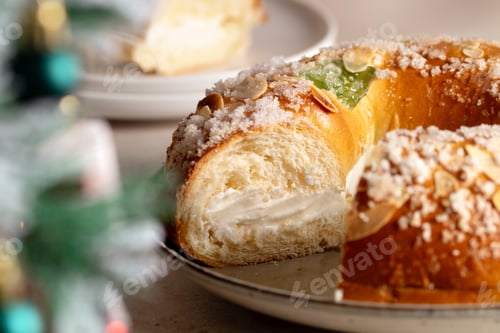 Preview: Spanish Three kings cake on decorated table with Christmas tree, celebration of Three Kings Day