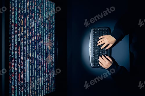 Preview: Cyber security threat. Young woman using computer to break protection. Network security threat