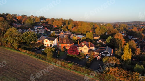 Preview: Small Village of Houses at Dawn Golden Hour Birdseye View Fall