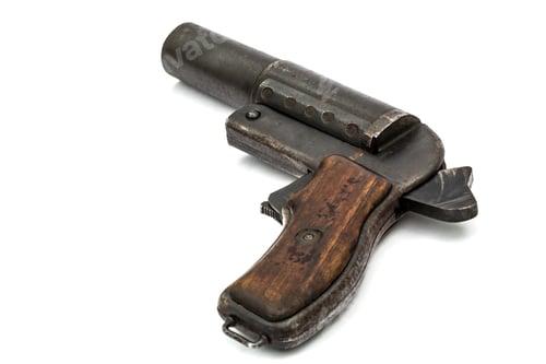Preview: Old signal pistol, flare gun with the hammer cocked, isolated on white