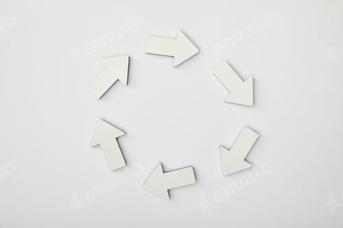 Preview: top view of white arrows in circle on grey background