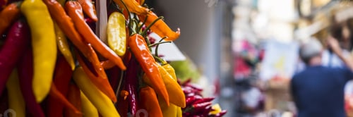 Preview: Spicy pepper colorfu chili on a flea food market in the street. Banner header of food store