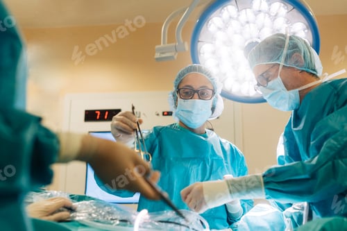 Preview: Team of surgeons operating in the hospital