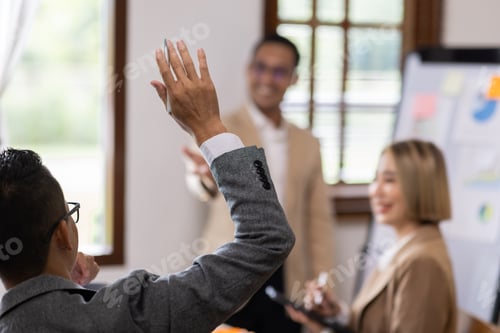 Preview: Group of confident business people point to graphs and charts to analyze market data, balance sheet,