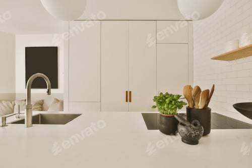 Preview: a kitchen with white cabinets and a sink and counter