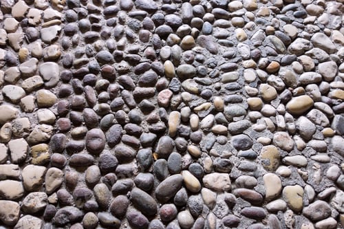 Preview: The Rough Textured Background From Stone Gravel Or Pebble Of Gray Color