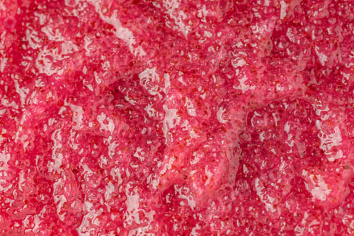 Preview: Cosmetic products jelly pink scrub texture smudge . Skin care product presentation.