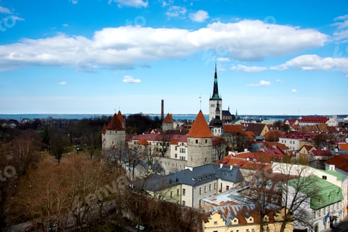 Preview: Charming medieval cityscape of Tallinn, Estonia, with red-roofed towers, historic churches