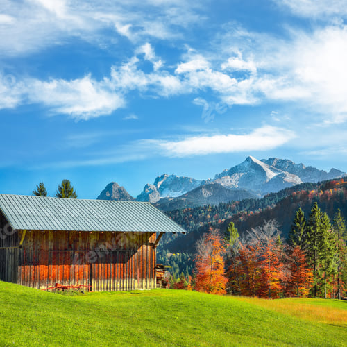 Preview: Amazing view of alpine meadow with wooden huts near Wagenbruchsee (Geroldsee) lake
