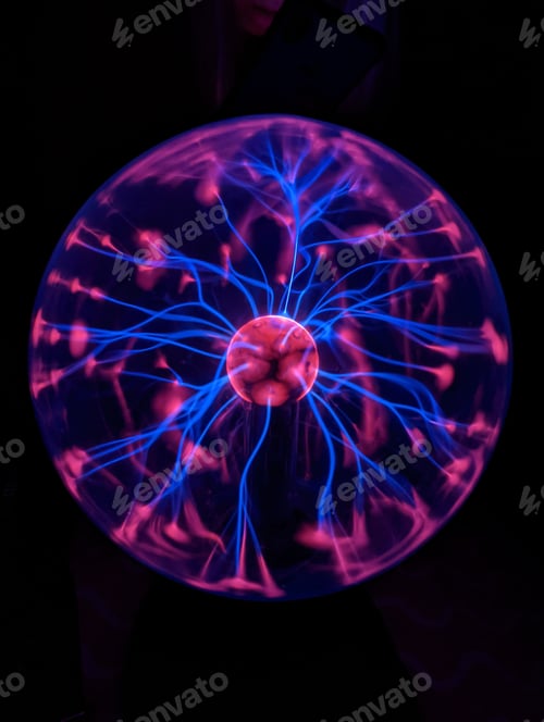 Preview: Vertical shot of a plasma lamp isolated on the dark black background