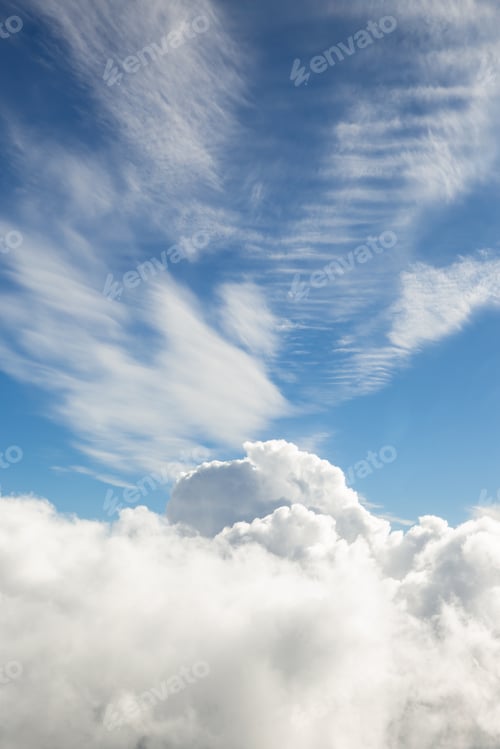 Preview: Fluffy white clouds, a view from airplane window