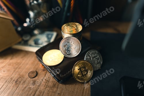 Preview: Bitcoin coins on a wooden desk at home