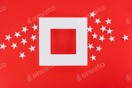 Preview: white frame with copy space and stars around, isolated on red
