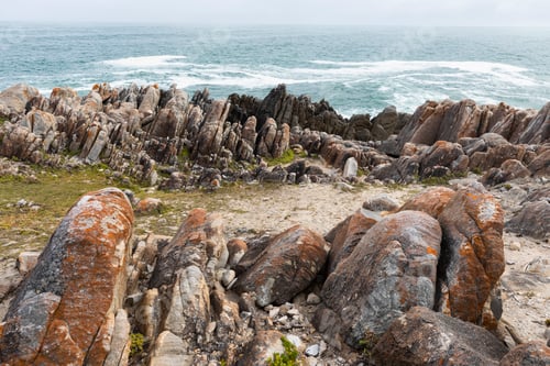 Preview: Jagged rocks and the rocky coastline of the Atlantic, vertical rock strata, geological formations.