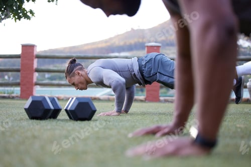 Preview: Shot of two men working out and doing pushups together