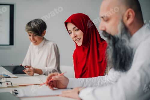 Preview: Business people working together in modern office meeting room