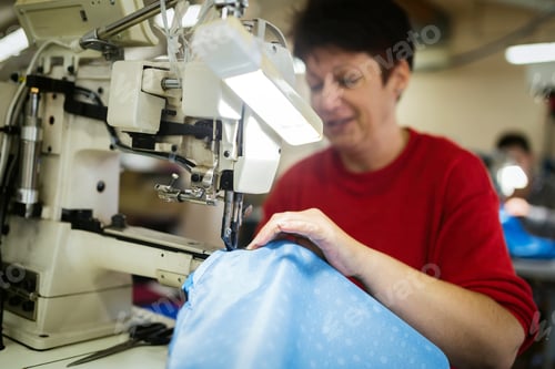 Preview: Woman working in textile industry