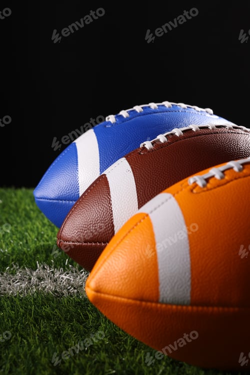 Preview: American football balls, rugby balls, different colours on grass and black backgrounds