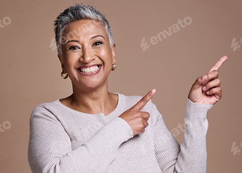 Preview: Woman, smile and happiness in studio for advertising free space, promo or mockup on a brown backgro