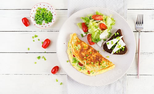 Preview: Omelette with tomatoes, cheese, green onions and sandwich with feta cheese