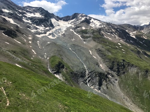 Preview: Snow on the mountain top in the summer