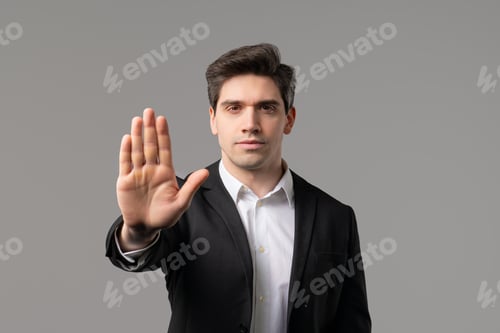 Preview: Serious mature businessman, rejecting gesture stop hand sign. Not Allow, restrict