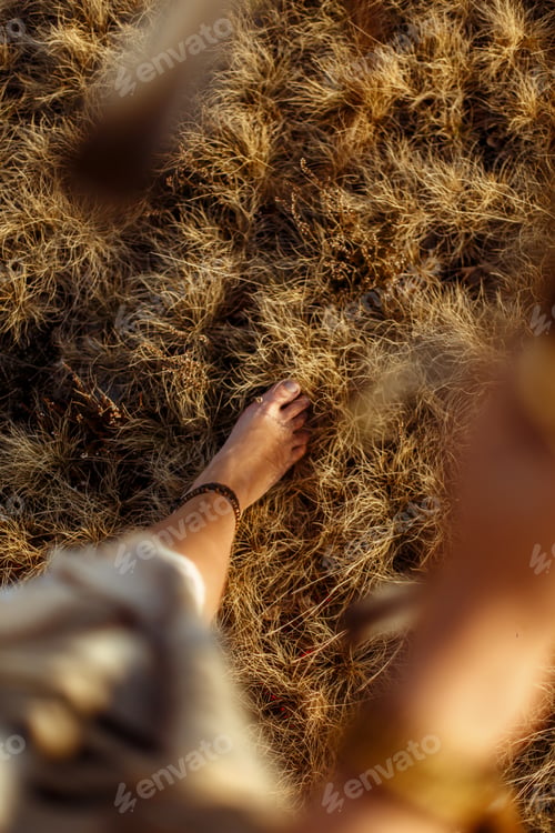 Preview: woman legs in native indian american boho dress walking