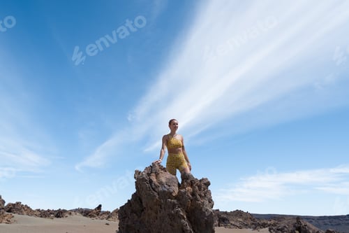 Preview: Woman hiking volcano landscape finding freedom