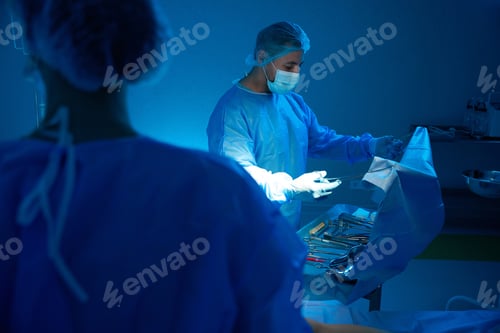 Preview: Surgeons Preparing for Operation in Hospital Room