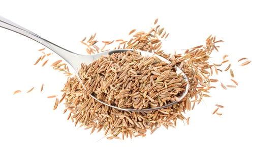 Preview: Cumin seeds or caraway in spoon isolated on white background