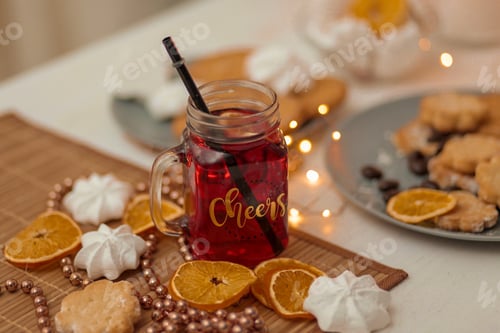 Preview: festive drink with cookies and orange slices