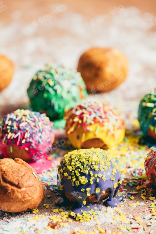 Preview: Colorful doughnuts on a kitchen counter.