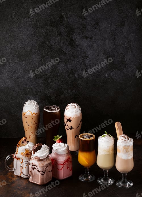 Preview: Vertical shot of tasty coffees and milkshakes on a dark background
