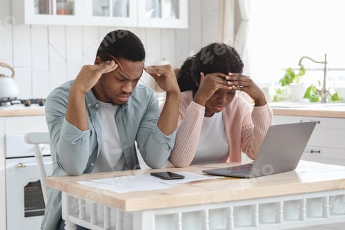Preview: Coronacrisis Concept. Depressed Black Couple Counting Family Budget At Home