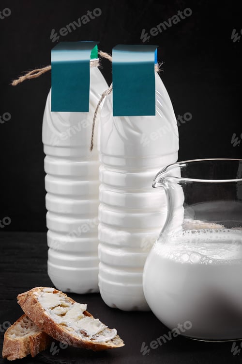 Preview: Farm setting with fresh milk in various bottles and cans