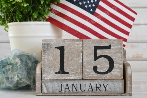 Preview: Martin Luther King Jr Day - wooden block calendar showing his birthday January 15 American flag