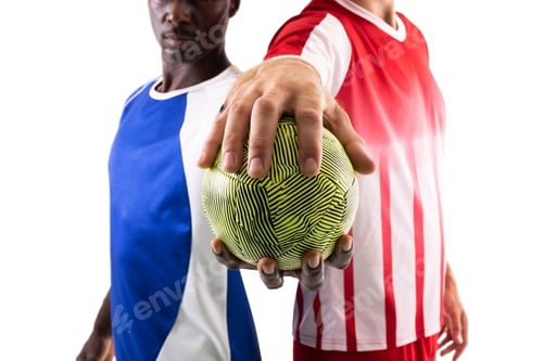 Preview: Male multiracial handball players holding green ball standing against white background