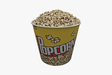 Preview: Popcorn overflowing from paper cup