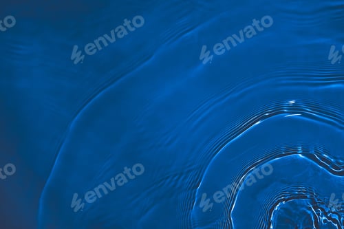 Preview: Transparent dark blue clear water surface texture with ripples, splashes and bubbles