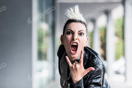Preview: Portrait of screaming punk woman at an arcade