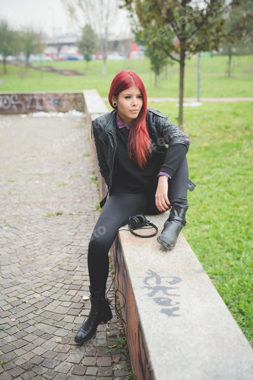 Preview: young beautiful red hair venezuelan woman lifestyle listening music