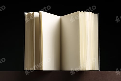 Preview: Black hardcover book or notepad mock up on black background