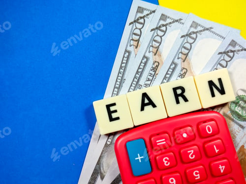 Preview: Calculator and dollar banknotes with word EARN on blue and yellow background.Business concept.
