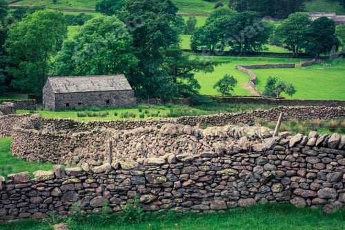 Preview: Old stone fence and a house in the Lake District, England