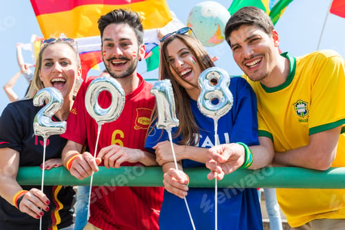 Preview: Happy fans supporters with 2018 sign together at stadium