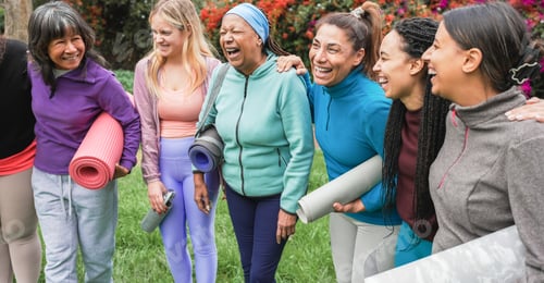 Preview: Multiracial women having fun together after yoga class outdoor in city park