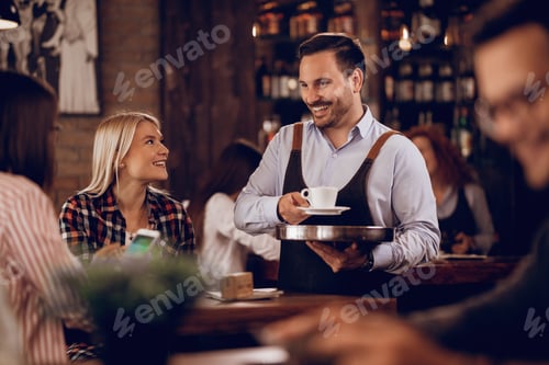 Preview: Happy waiter communicating with customers while serving them coffee in a pub.