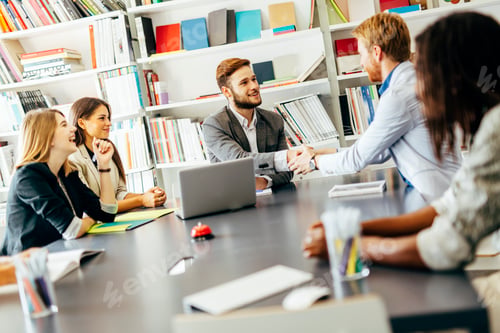 Preview: Businesspeople shaking hands in office