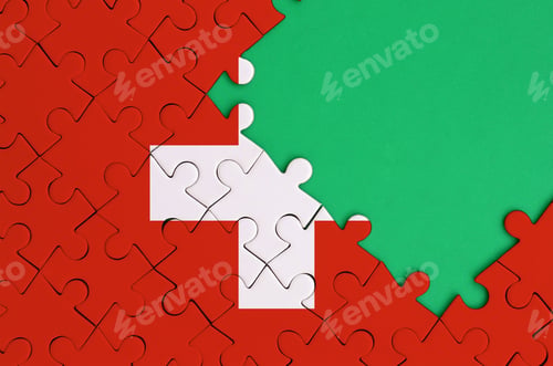 Preview: Switzerland flag is depicted on a completed jigsaw puzzle with free green copy space on the right