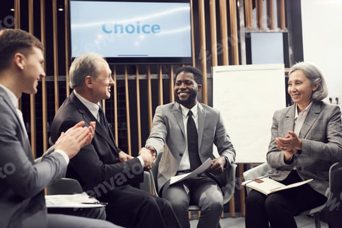Preview: Business people interacting with each other